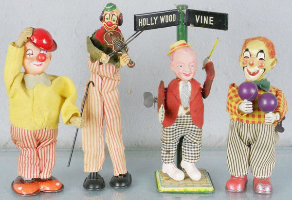 4 CLOWN TOYS: litho tin, plastic & cloth, all are windup working, TPS Violin Player, 9" tall, Dancing Man, 8 1/2" tall, Maracca-playing Clown, 7" tall, KO Clown, 7 1/2" tall, C5-7.
