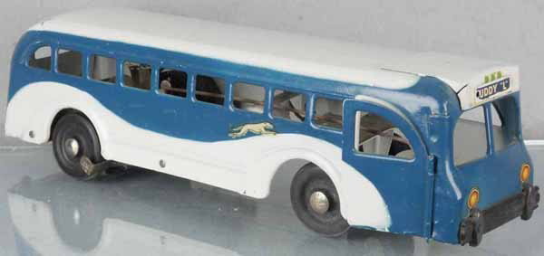 BUDDY L BUS: painted pressed steel, windup working, 16" long, decals minor wear, rear rubber bumper broken, C7.