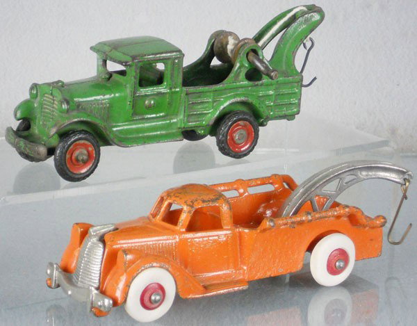 2 CAST IRON WRECKERS: painted cast iron, AC Williams Wrecker, 7 long, tires replaced, Hubley Wrecker, nickel trim, 6 3/4" long, rubber tires replaced, C5-6.