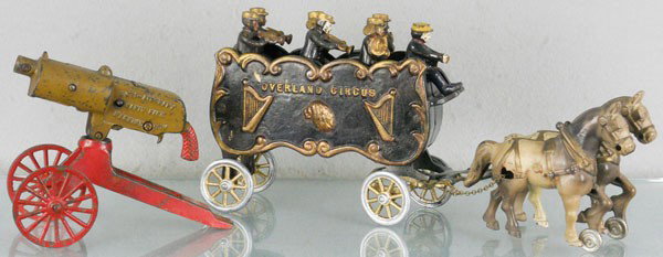 2 CAST IRON TOYS: painted cast iron, Grey Iron Cap Cannon, 7 1/2" long, Kenton Overland Circus, 15" long, old repaint, C4-6.