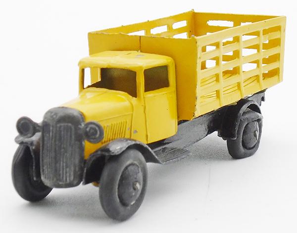 DINKY 25F MARKET GARDENERS LORRY: yellow & black, black tires, metal hubs, rear tires flat, open frame has epoxy for strength, tow hook broken, minor warping, C6-7.