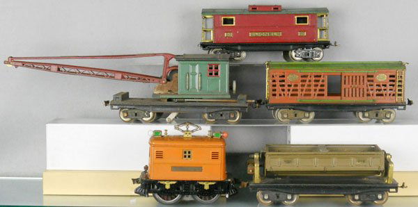 LIONEL TRAIN SET: std ga, 9 loco, customized, 218 dump, 213 stock, 219 derrick, hook not shown in photo, 217 caboose, 2 couplers broken, set is playworn, dirty & has surface oxidation, C4-5.