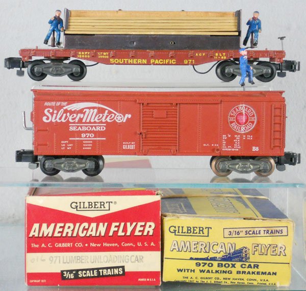 2 AMERICAN FLYER OPERATING CARS: S ga, 971 lumber unloading car, 970 box car w/brakeman, orig boxes minor wear, C7-8.