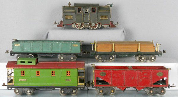LIONEL TRAIN SET: std ga, 33 Corporation loco, 512 gondola, 511 lumber, 516 hopper, 517 gondola, set is playworn, dirty & has surface oxidation, C5.