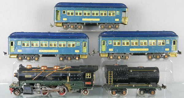 LIONEL TRAIN SET: O ga, 260E loco, some oxidation on siderods, 260T tender, 2 #710 Pullmans, 712 obsv, w/green doors, set is scratched, C4-5.