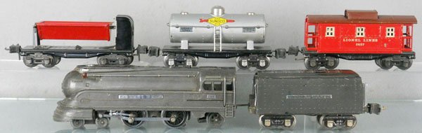 LIONEL TRAIN SET: O ga, 238E loco, 265W tender, 3659 dump, 2654 Sunoco tank, 2657 caboose, C5-6.
