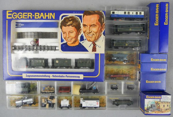 EGGER-BAHN TRAIN LOT: HO 9mm ga, 5002 train set w/2 locos, passenger, freight & mining train cars, w/track, controller, transformer & loco shed, orig boxes minor wear, C8-9.
