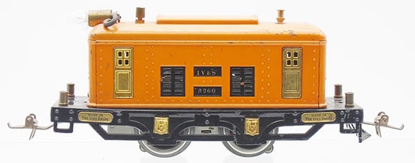 IVES 3260 ELECTRIC LOCO: 0 ga, orange w/black die cast frame, 1 cowcatcher broken, paint wear on roof, C6.