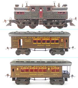 IVES TRAIN SET: 1 ga, 3239 electric loco, gray painted cast iron, w/1 motor that spins, missing handrails & 1 door knob, overall heavy oxidation, 71 buffet car, 73 obsv, cars are brown, red & gold, 2-tone gray roofs,