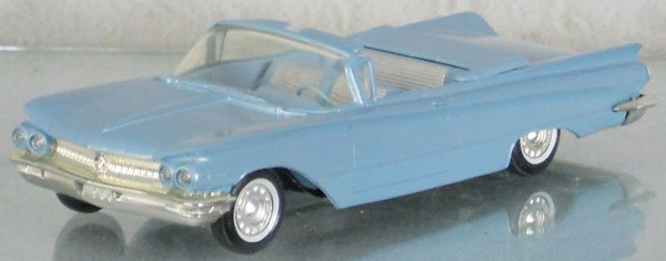 AMT 1960 BUICK INVICTA PROMO: plastic, blue, friction working, minor body warp, C8.