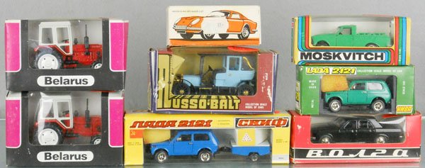 8 RUSSIAN VEHICLES: Lada 2121 Car w/Trailer, 2 Belarus Tractors, Russo Balt Oldtimer Car, Moskovitch Pick Up, Volga Auto, Igra Ferrari, orig boxes some wear, C8-10.