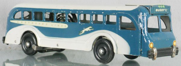 BUDDY L GREYHOUND BUS: painted pressed steel, windup not tested, w/battery lights, 16" long, 1 paint spot on roof, C6.