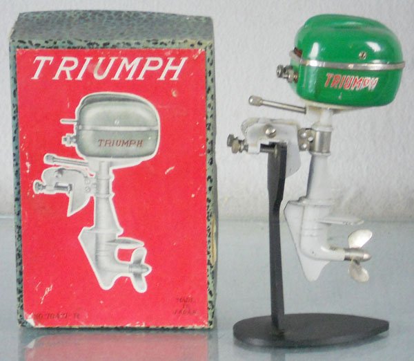 TRIUMPH OUTBOARD MOTOR: Japan, die cast, battery operated, not tested, 5" tall, orig box minor wear, stand not included, C8.