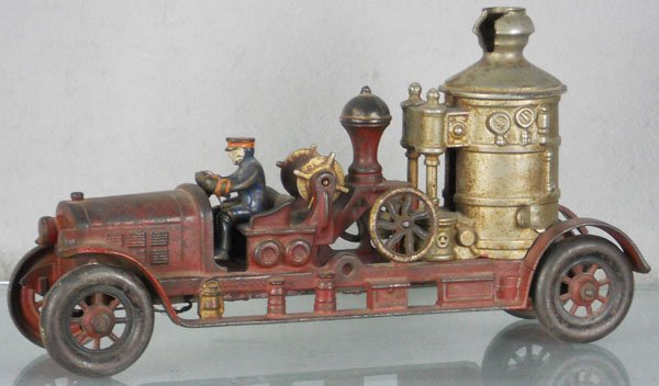 KENTON FIRE ENGINE: painted cast iron, 14" long, 3 fenders & boiler chimney chipped, 3 hose hangers chipped, 1 hanger missing, C4.