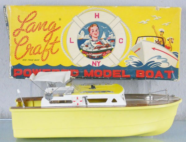 LANG CRAFT POWER BOAT: Japan, wood & plastic, battery operated, not tested, missing radio antenna, transom area melted, 13" long, C6.