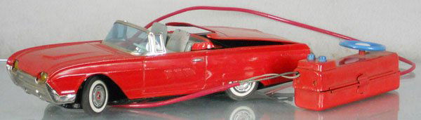 YONEZAWA 1963 FORD THUNDERBIRD: litho tin, battery operated, not tested, 11" long, flocking on seats worn, C6-7.