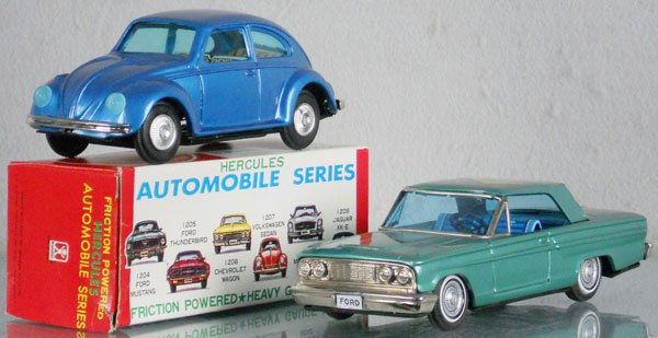 2 BANDAI AUTOS: litho tin, friction working, 1207 Volkswagen Beetle, 7" long, orig box, Ford Fairlane, 8" long, C8-9.