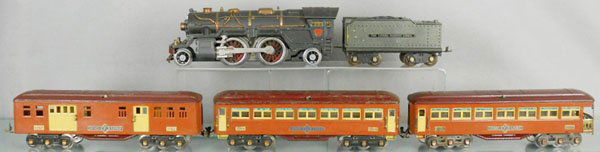 LIONEL TRAIN SET: std ga, 385E loco, trucks are rewheeled, steamchest replaced, missing handrails on pilot, 385W tender, paint chipped, 1767 baggage, 1766 Pullman, 1768 obsv, car sides repainted, C4-5.