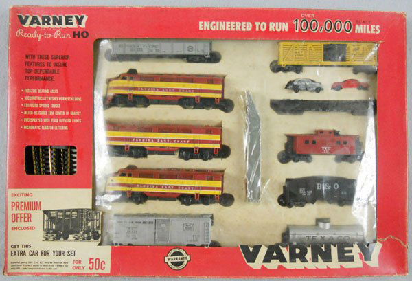 VARNEY 2807 TRAIN SET: HO ga, Golden Eagle Florida East Coast w/ABA diesel, 7 freight cars & track, orig window box & inserts minor wear, C8.