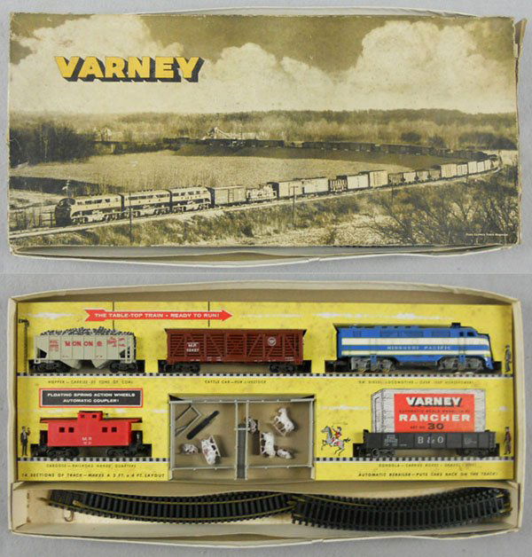 VARNEY 30 RANCHER TRAIN SET: HO ga, 2-rail, Missouri Pacific diesel w/4 freight cars & cattle pen, pen has 2 cracked pieces, orig set box bottom & insert minor wear, top rough, C7-8.