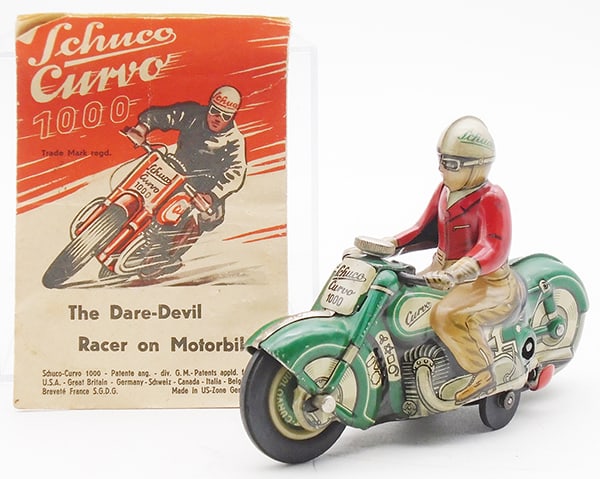 SCHUCO 1000 CURVO MOTORCYCLE: Litho tin, green, 4 3/4 in long, windup working, runs 7 different patterns by adjusting steering knob, instruction sheet worn, orig Schuco issue, made in US Zone Germany, C8.