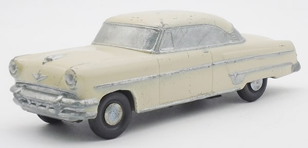 BANTHRICO 1954 LINCOLN AUTOBANK PROMO: Lincoln Cosmopolitan, ivory, w/bank imprint, paint chipped, chassis bent where someone tried to steal the money, C5-6.