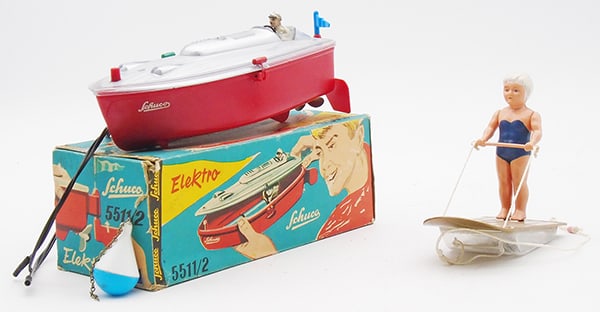SCHUCO 5511/2 WATER SKIER SET: Plastic, Elektro Boat, battery operated, working, w/line & buoy, orig box some wear, 3009 Flotano Girl, blue bathing suit, C7-8.
