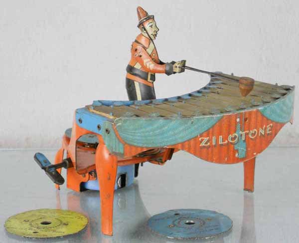 WOLVERINE ZILOTONE: litho tin, windup working, 8" long, w/3 records, Farmer in the Dell, Sidewalks of NY, My Old Kentucky Home, C5-6.