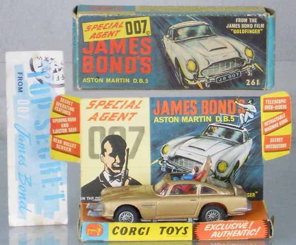 CORGI 261 JAMES BOND ASTON MARTIN: w/instruction sheet, orig box & display insert minor wear, C7.