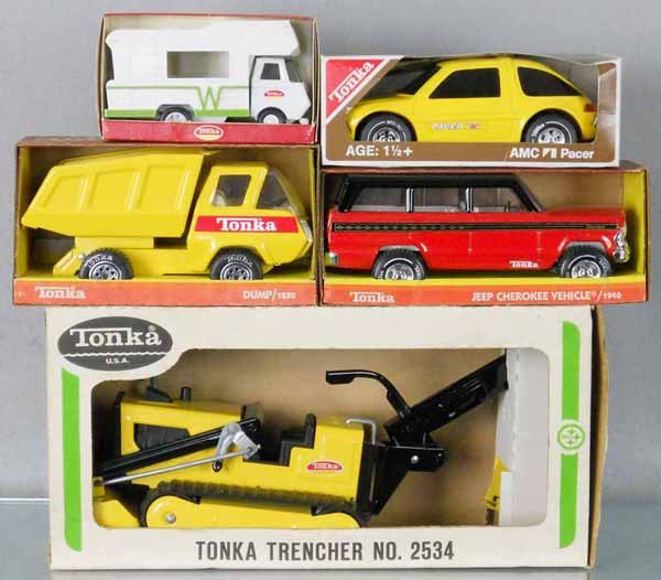 5 TONKA VEHICLES: painted pressed steel, 2534 Trencher, 1940 Jeep Cherokee, 1830 Dump Truck, 1973 Pacer, 800 Camper, 6" to 15" long, orig boxes minor wear, C9.