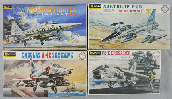 4 FUJIMI AIRPLANE KITS: plastic, Freedom Fighter, Northrop F-5B, Douglas Sky Hawk, Crusader, most parts still attached to trees, orig boxes minor wear, 1 factory sealed, C9-10.