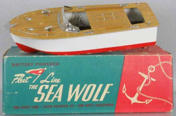 FLEET LINE SEA WOLF BOAT: plastic & wood, 16" long, some paint wear on hull, w/flag, not shown in photo, battery operated, not tested, orig box & insert minor wear, C8.