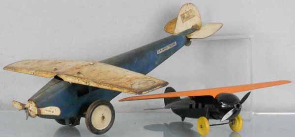 STEELCRAFT & WYANDOTTE AIRPLANES: painted pressed steel, Steelcraft Mail Plane, decals worn, some surface oxidation, 22" wingspan, Wyandotte Monoplane, 18" wingspan, old repaint, C4-6.