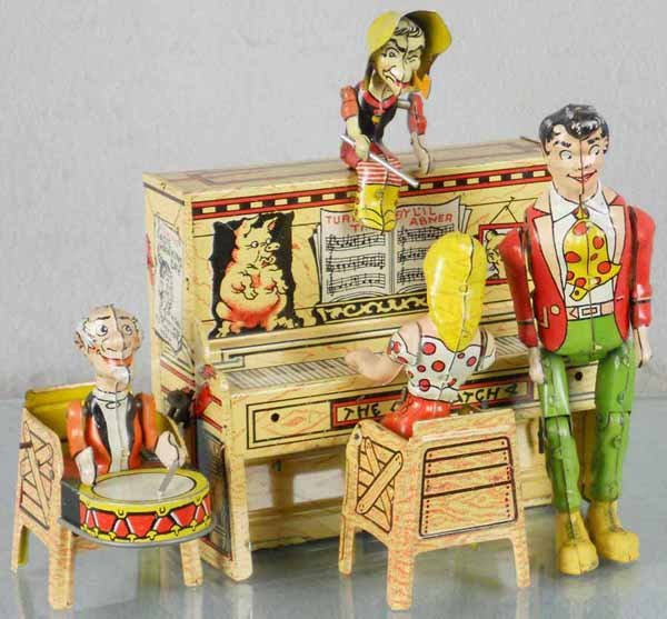 UNIQUE ART DOGPATCH BAND: litho tin, windup working, missing 1 drumstick, 8" tall, C7.