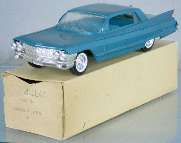 JOHAN 1961 CADILLAC PROMO: plastic, Lexington green, friction working, body warped, windows glazed, orig box minor wear, C8.
