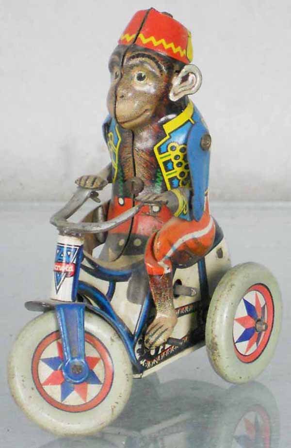 ARNOLD MONKEY CYCLIST: litho tin, windup working, 4" tall, C6.