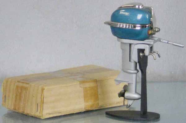 JAPANESE SPEED OUTBOARD MOTOR: die cast & tin, 5 1/2" tall, stand not included, orig box worn, C7-8.