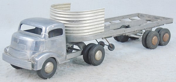 SMITH MILLER 310H GMC HI-WAY FREIGHTER: die cast & aluminum, silver, missing wood sides & trailer base, cab decals worn, 1 decal worn, 1 decal missing, ca 1948, C5.