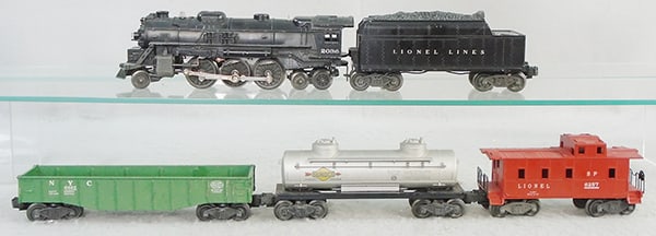LIONEL TRAIN SET: O ga, 2036 loco, 2 broken pilot steps, 6466W tender, 6462 gondola, 6465 tank, 6257 caboose, C6-7.