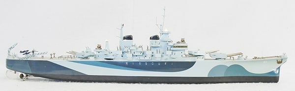 KMK BATTLESHIP MISSOURI: painted wood, 34", battery operated, not tested, twin motors & lights, made ca 1950s, missing 1 small gun turret, shows the Peace Table wear the surrender was signed, C8.