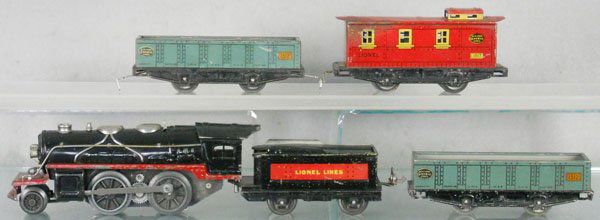 LIONEL TRAIN SET: O ga, 1681 loco, 1661 tender, 2 #1512 gondolas, 1517 caboose, some oxidation spots, C4-5.
