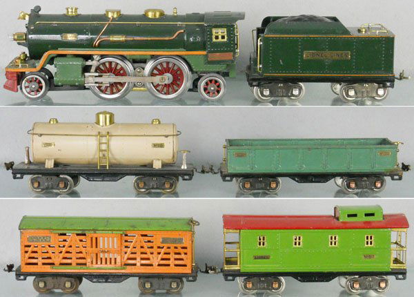 LIONEL TRAIN SET: std ga, 390E loco, rewheeled, 390T tender, restored in green, 512 gondola, some surface oxidation spots, 515 tank, 513 stock car, some surface oxidation spots, 517 caboose, missing 3 brakewheels, C5-7