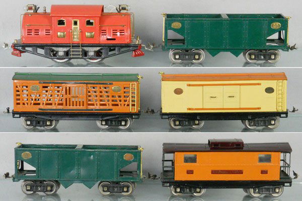 LIONEL TRAIN SET: std ga, 380 loco, 2 #216 hoppers, both doors & mechanism missing, 214 box car, missing 1 brakewheel assembly & data plate, 213 stock car, missing all trim on 1 side, 217 caboose, trim insert loose, se