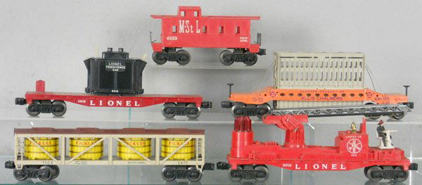 5 LIONEL FREIGHT CARS: O ga, 6475 pickle car, 3512 fire ladder car, 6818 transformer car, 1 insulator broken, 6519 Allis Chalmers, brakewheels intact, 6059 caboose, C6-8.