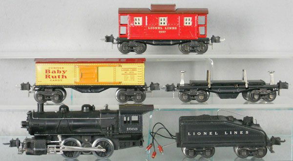 LIONEL TRAIN SET: O ga, 1663 switcher, 2201T tender, 1679 box car, 3651 operating flat, 2657 caboose, C5-6.