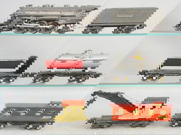 LIONEL TRAIN SET: O ga, 224E loco, corner bent on cab roof, both steps on pilot bent, 2689TX tender, 3659 dump car, 2654 Sunoco tank, decal chips, 2660 crane, working, 1 crank peg broken on side wheel, 1682 caboose, C5