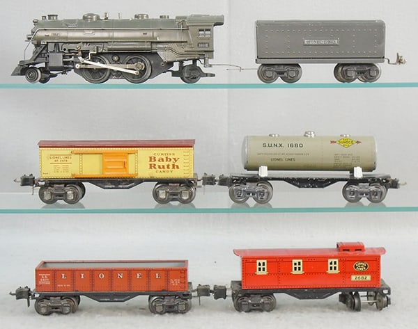 LIONEL TRAIN SET: O ga, 1664E loco, 1689T tender, both are gunmetal, 2679 box car, 1680 Sunoco tank, 2677 gondola, 2682 caboose, C6-7.