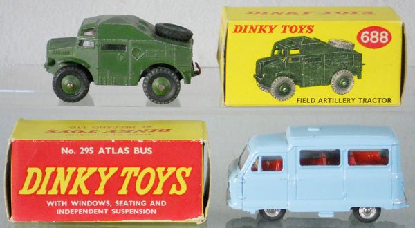 2 DINKY VEHICLES: 688 Field Artillery Tractor, new hitch soldered to base, orig box, C5; 295 Atlas Bus, orig box minor wear, 1 flap loose, C8.