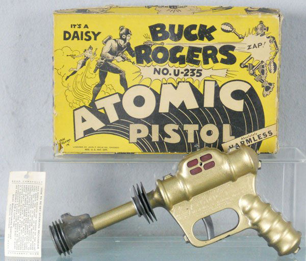 DAISY BUCK ROGERS ATOMIC PISTOL: litho tin, working, 10" long, w/tag, orig box worn, C8.
