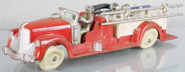 HUBLEY FIRE TRUCK: painted cast iron, 13 1/2" long, rubber tires replaced & flat, ladders & hose replaced, C5-6.